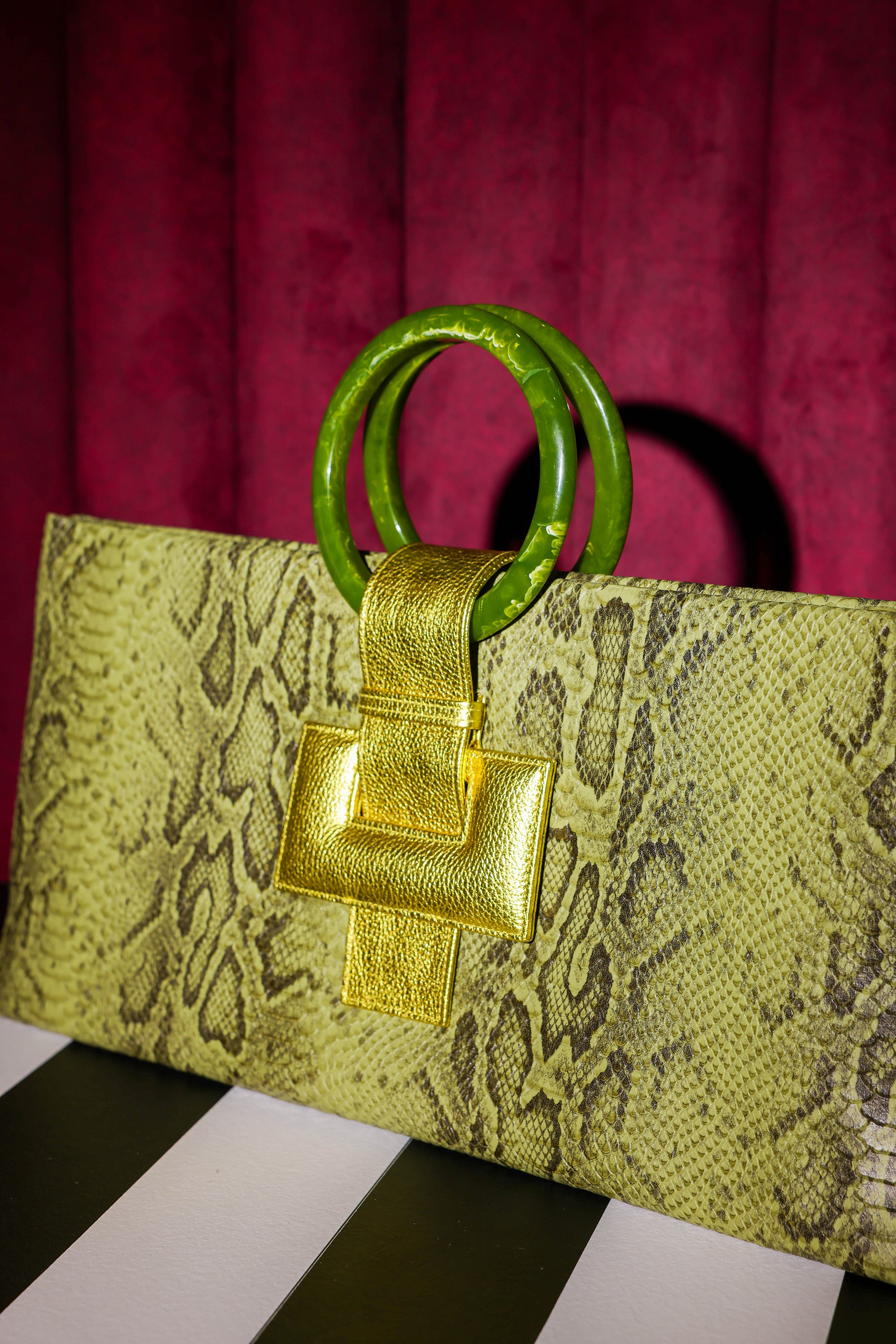 NEW ARRIVAL - Elongated Round Handle Celeste Rectangular Bag Green Python