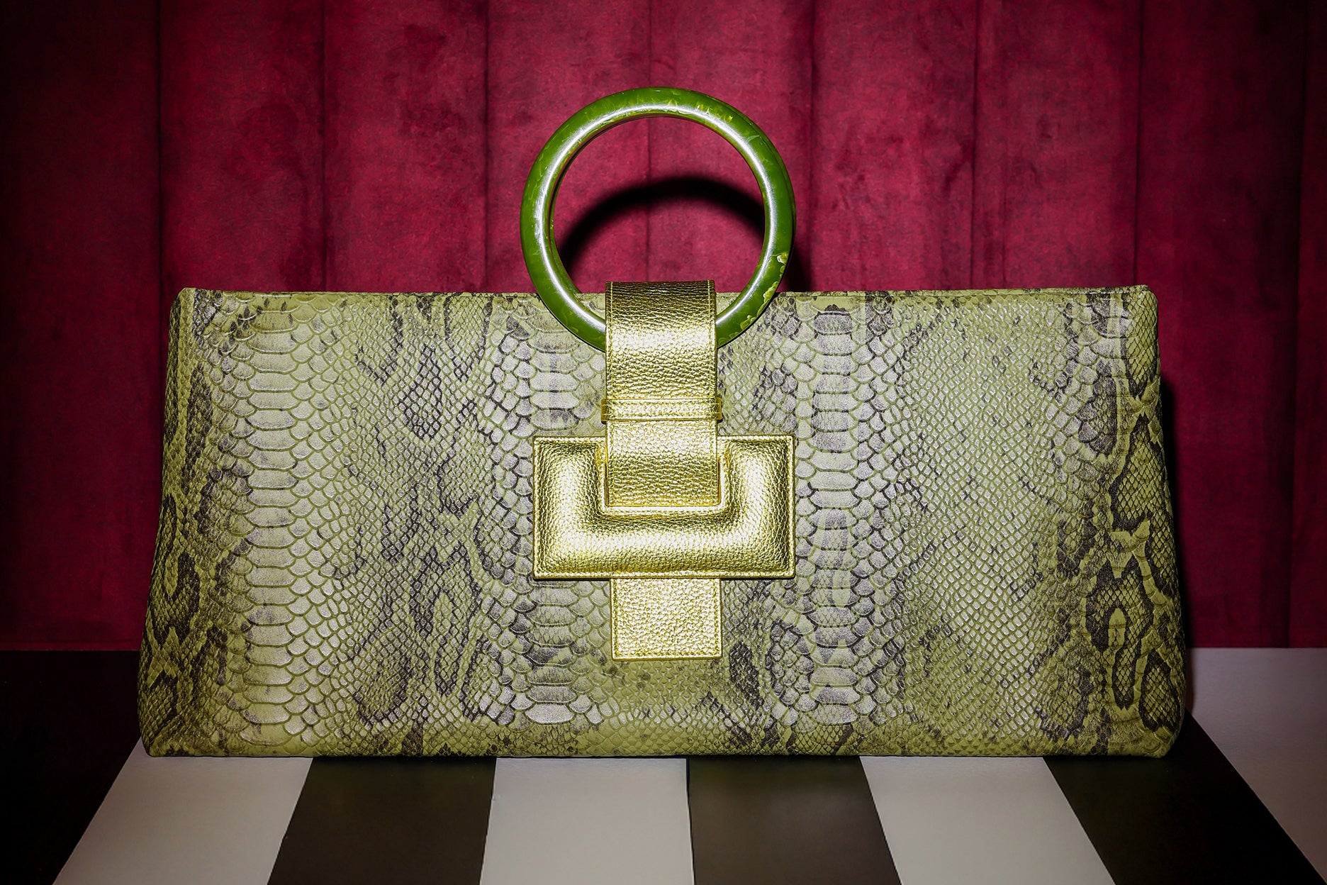 NEW ARRIVAL - Elongated Round Handle Celeste Rectangular Bag Green Python